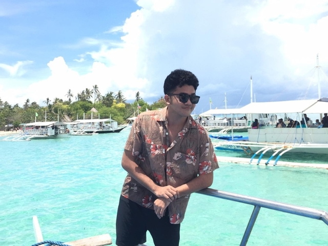 Lance Javate on a boat